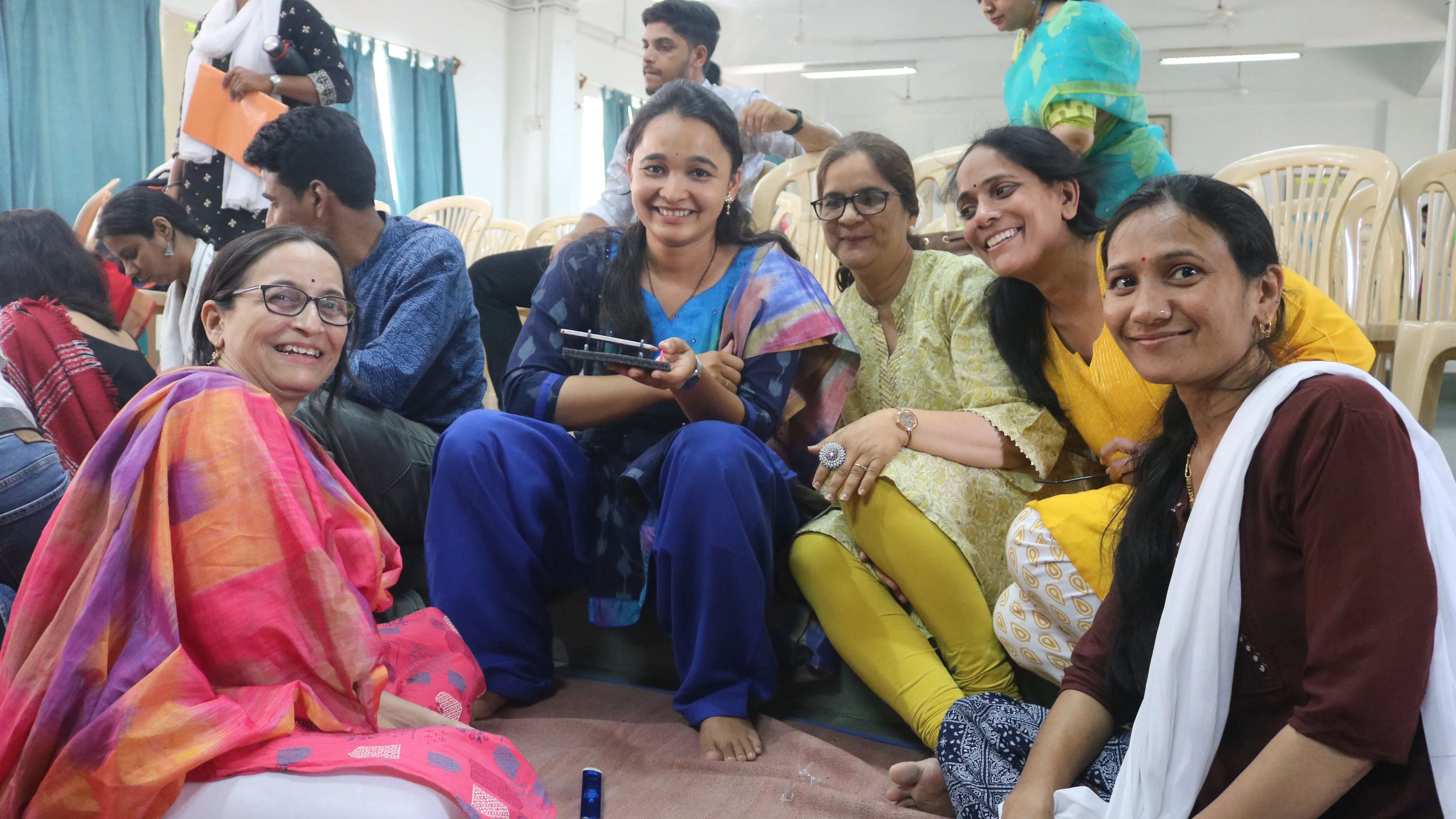 Teachers pose with Shivani Pethe after a workshop